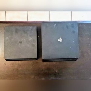 Sony Dual PlayStation 4 Slim And Pro Consoles in Black"READ DESCRIPTION PLEASE"